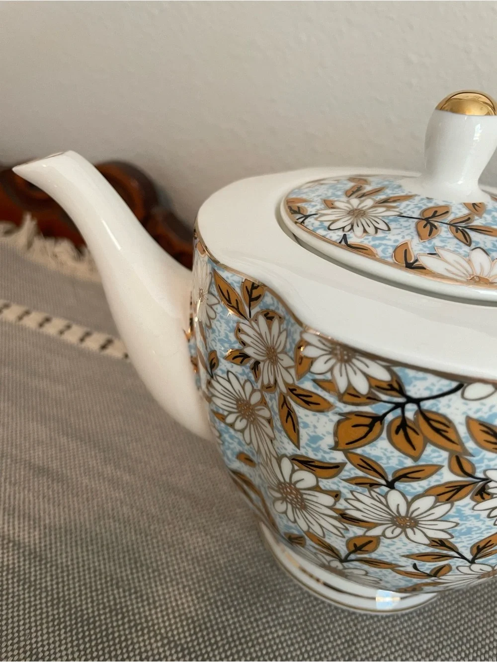 Elegant Floral Porcelain Teapot and Cup Set in Blue and Gold